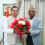 Dr. Mohan Singh Bisht met CM Dhami