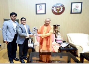 Sify Chairman Raju Vegesanane meets CM Yogi