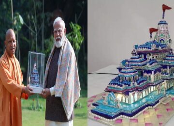 CM Yogi presented a pink enamelled replica of the Shri Ram Temple to PM Modi.