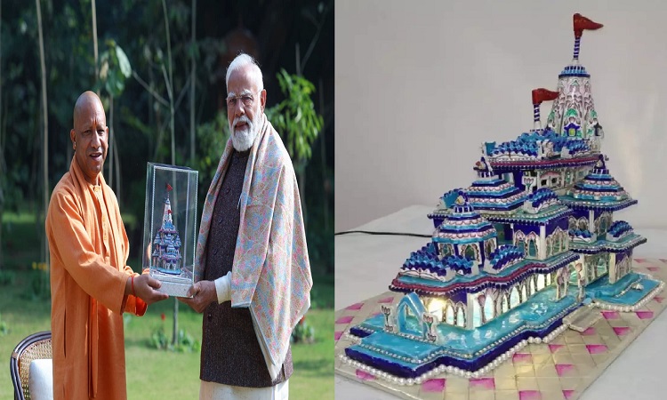 CM Yogi presented a pink enamelled replica of the Shri Ram Temple to PM Modi.