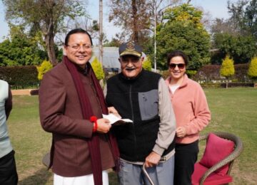 Retired Brigadier met CM Dhami and handed over the cheque.