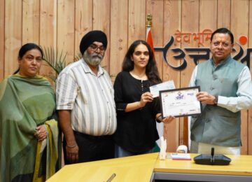 CM Dhami honored meritorious students