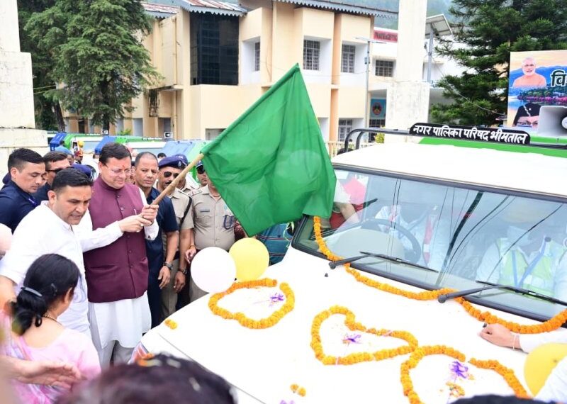 CM Dhami flags off five new garbage vehicles