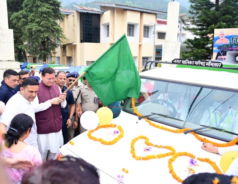 CM Dhami flags off five new garbage vehicles